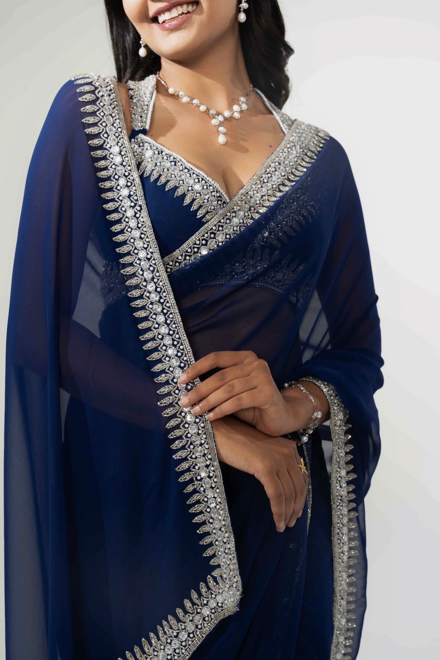 Nilam Navy Blue Hand Embellished Saree